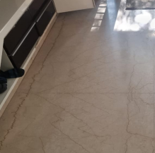 Dush Nitro Glow step 1 — apply to white marks on black marble