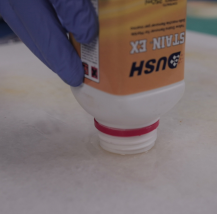 Dush Stain-Ex Step 1 — apply undiluted to yellow stain on white marble