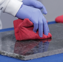 Dush Wet Look step 2 — apply to dark marble with cloth