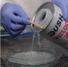 Dush Wet Look Silk step 2 — apply evenly on black marble with cotton cloth