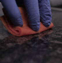 Dush Wet Look Silk step 3 — repeat 2–3 coats and allow 24 hours on dark marble
