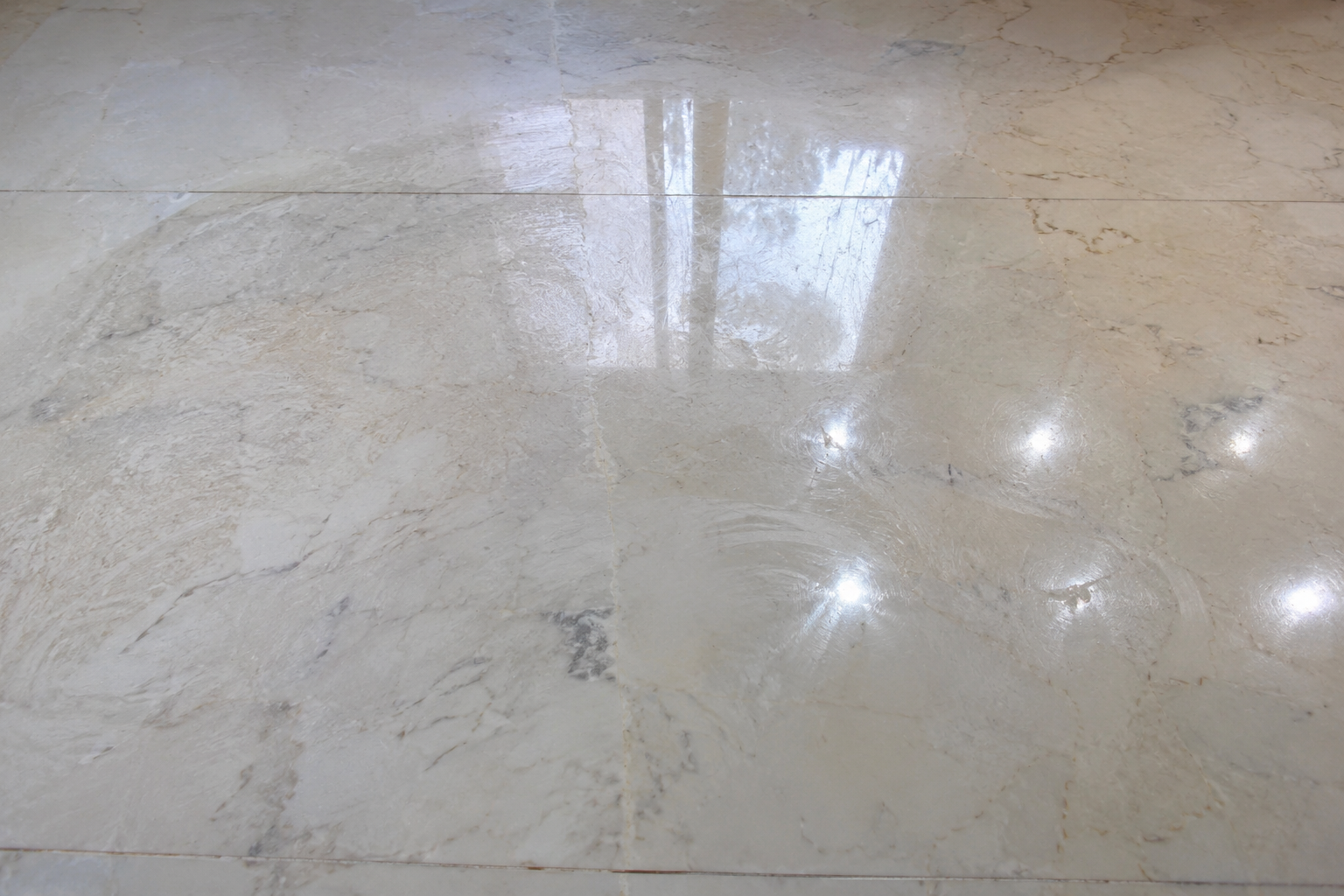 Old floor polish making marble look dull
